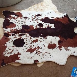 Fake cow print rug